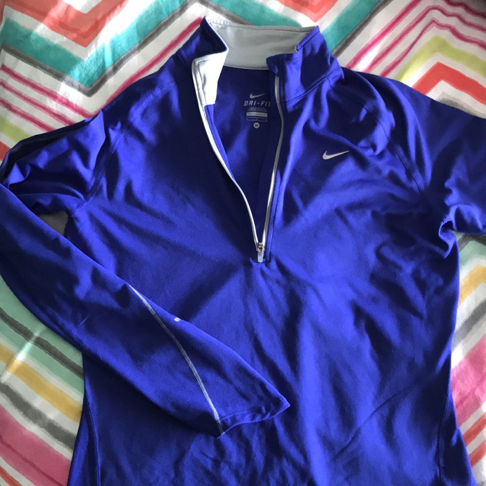 blue nike women’s quarter zip